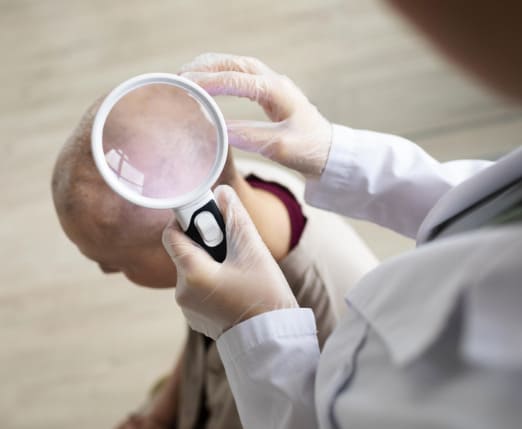 doctor-doing-check-patient-with-skin-cancer